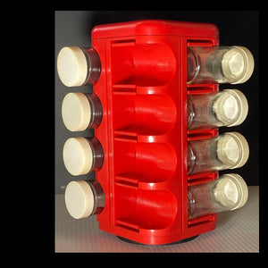 Vintage M.Kamenstein red rotating spice rack.